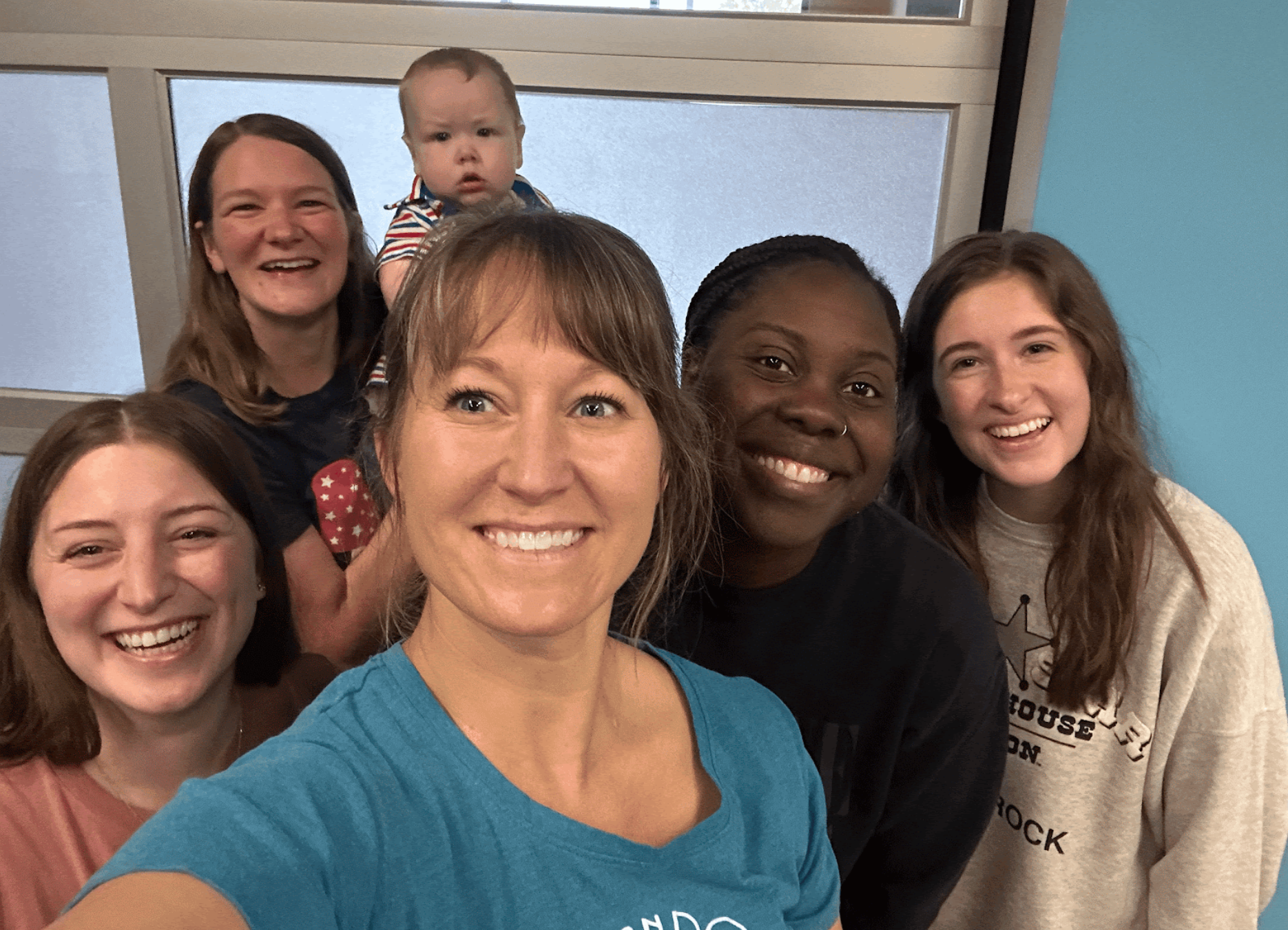 Confident diverse research team, reflecting teamwork and support.