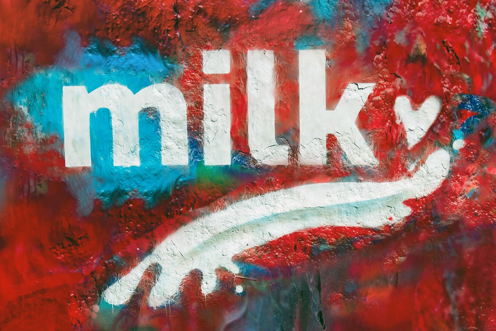 "Milk" text with vibrant colors and textures.